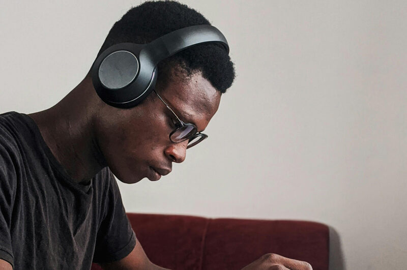 black man with headphones on , Adult autism testing, Fort Collins, CO