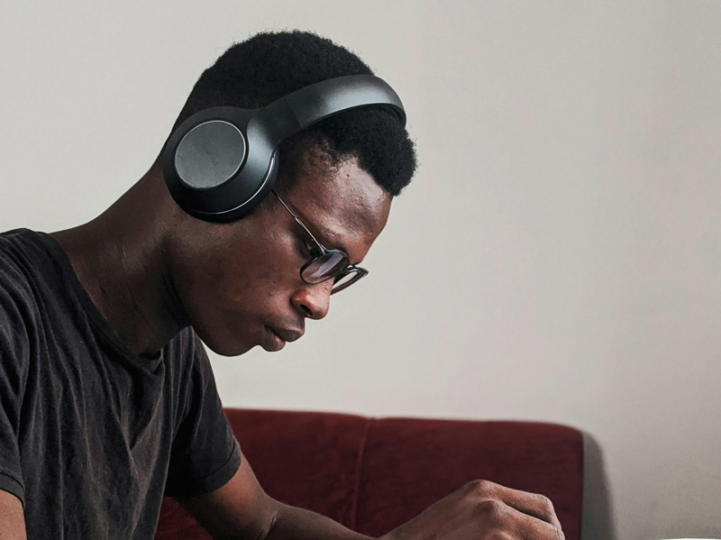 black man with headphones on , Adult autism testing, Fort Collins, CO